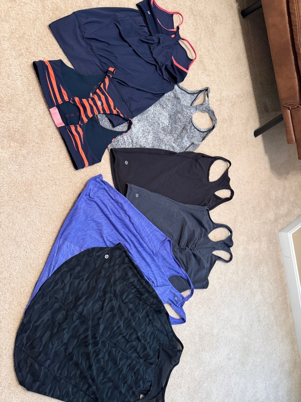 6 lululemon size 8/10 tanks and 1 bra